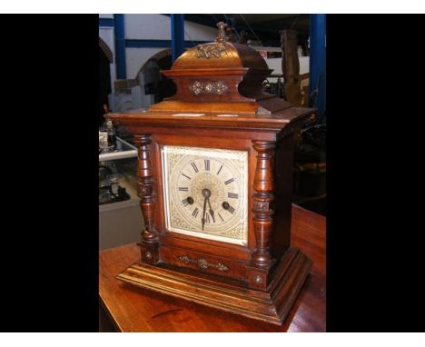 A 40cm high wooden cased mantel clock