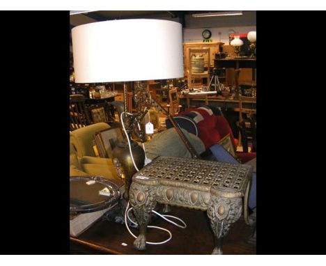 An elegant Ewer table lamp together with a pierced brass footman