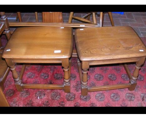 A pair of Ercol occasional tables