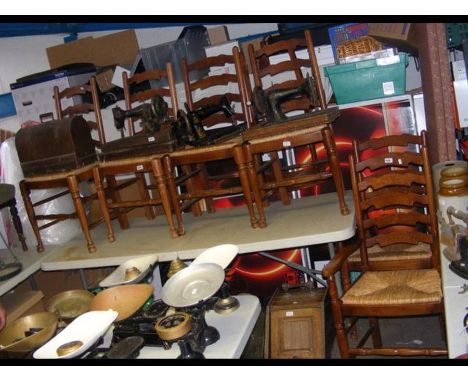 A set of six ladder back dining chairs 