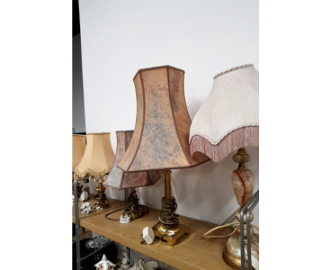 A GILT AND ONYX TABLE LAMP TOGETHER WITH FOUR BRASS TABLE LAMPS AND SHADES
