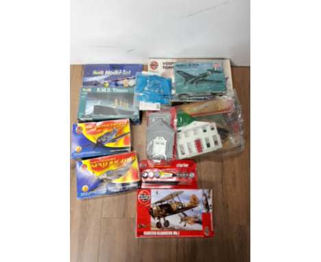 A LOT OF AIRFIX STARTER KITS AND SPITFIRE MK1 AND REVELL MODEL R M S TITANIC SET