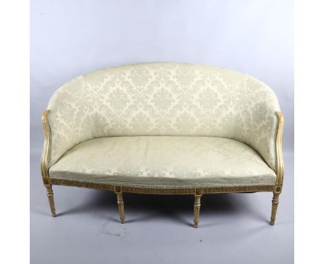 A French salon sofa with carved giltwood frame, on 8 legs, length 147cm (4'10") 