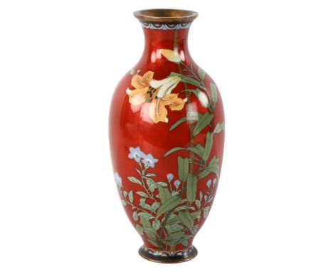 A Japanese red ground cloisonne enamel vase, decorated with exotic flowers, late 19th/early 20th century, height 24cm 