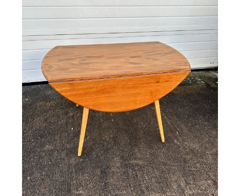 Ercol - Windsor – an Ercol blond elm mid-century drop leaf dining table. Length 113cm, height 72cm, width 65cm. There are som