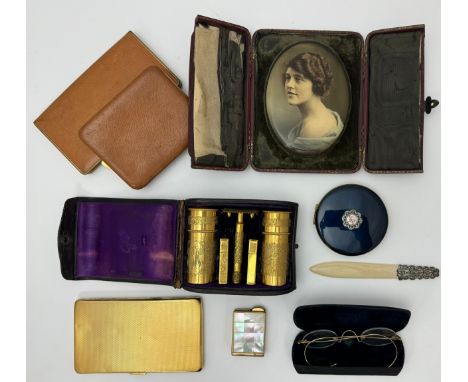 A mixed range of items to include: a Colibri mother of pearl lighter, a vintage boxed Gilette razor set, a faux ivory bookmar