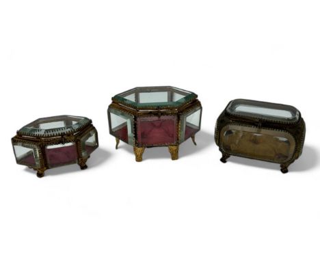 Three 19th Century glass jewellery / trinket caskets, possibly French. Includes two hexagonal boxes with red quilted base and