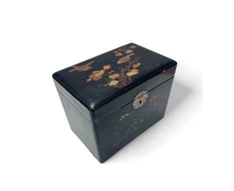 A Japanese black lacquer tea caddy with hand painted bird and flower decoration.