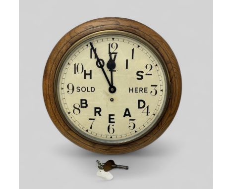 Vintage advertising wall clock made in England, Unsure of maker. Clock has recently been cleaned by a professional clockmaker