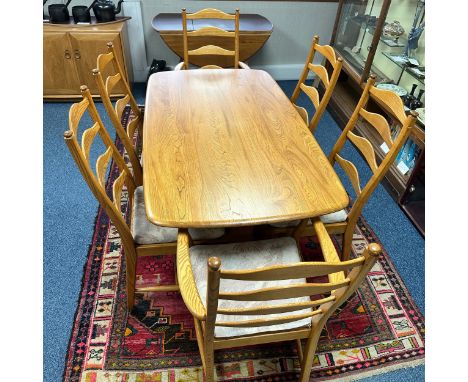 Ercol – Southwold – an Ercol Southwold Dining Set including table, four dining chairs and two carvers. Chairs measure approx.