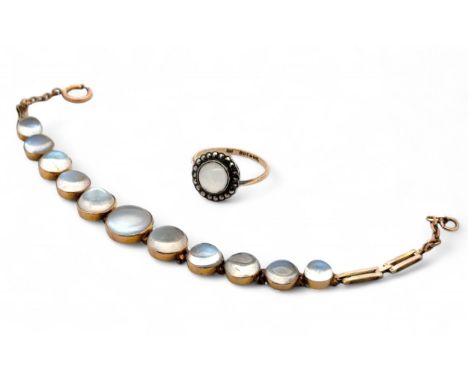 A graduated moonstone bracelet with good adularescence, stamped 9ct to clasp, 18cm length, 7.22g. Some surface scratches to m