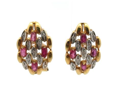 A pair of ruby and diamond earrings in 18ct yellow gold.
