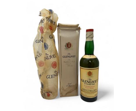 The Glenlivet Aged 12 Years Unblended All Malt Scotch Whisky. Boxed (water damged to bottom) and sealed with original paper w
