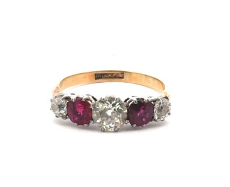 An old cut diamond and ruby five stone ring, size R. 3.90g. Principal diamond 6.1mm, estimated approx 0.80ct. Estimated total