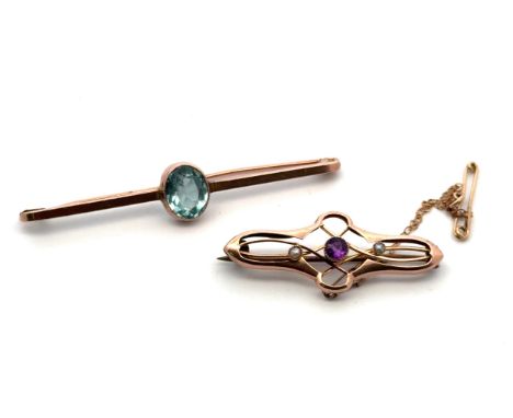 Two vintage gem set brooches. A 4cm long 9ct gold amethyst and seed pearl knot brooch, hallmarks for Harry &amp; Charles Bank