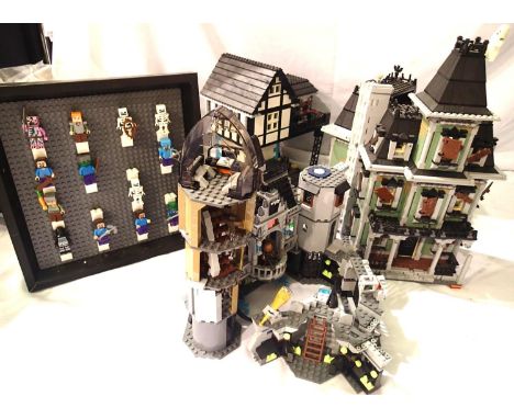 Three built Lego houses/buildings and Lego freestanding display board with thirteen figures. P&amp;P Group 3 (£25+VAT for the