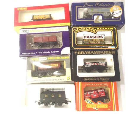 Eight assorted OO scale wagons, Hornby, Dapol, Mainline, Wrenn etc. mostly in very good. P&amp;P Group 1 (£14+VAT for the fir