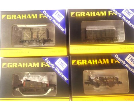 Four Fairsh/TMC weathered N gauge wagons; five plank Moody, Pill Box brake van, 12T vent van, eight plank Coke rail, all in e
