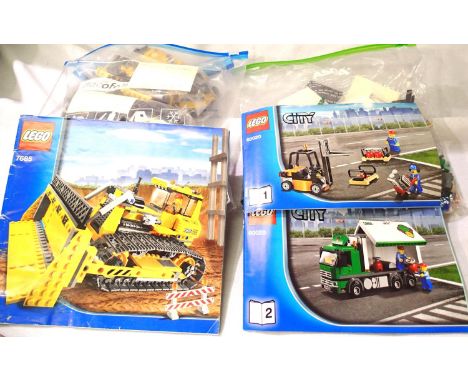 Two Lego vehicles; 7685 Bulldozer and 60020 Cargo Truck, both unboxed. P&amp;P Group 2 (£14+VAT for the first lot and £3+VAT 
