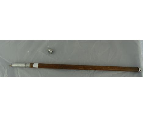 A military-style baton with lighter inside handle