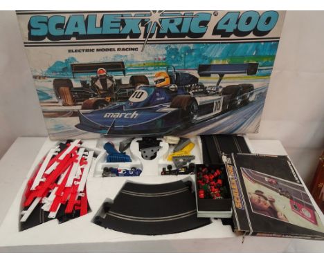 Boxed Scalextric 400, and Lapcounter; together with a box of Britains Military Musicians