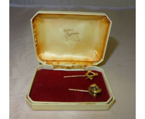 A 9ct Masonic tie pin; together with one other