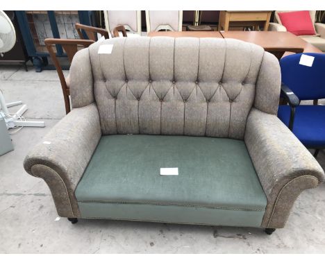 A VINTAGE TWO SEATER SOFA (FOR RE-UPHOLSTERY) 