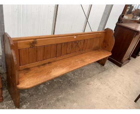 A VINTAGE PINE CHURCH PEW 