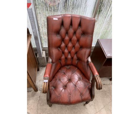 A RED LEATHER BUTTON BACK MAHOGANY ARMCHAIR 