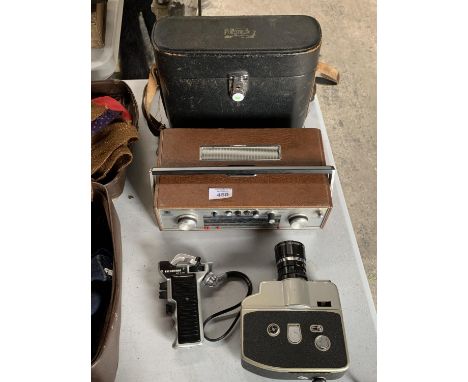 AN 1980'S VINTAGE CINE CAMERA AND CASE 