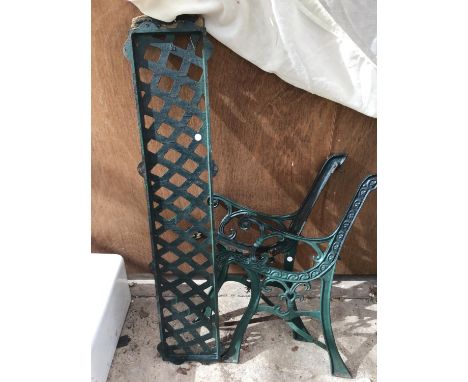 A PAIR OF CAST IRON BENCH ENDS AND A LATTICE BACK PANEL 