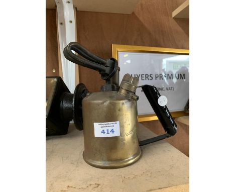 A VINTAGE BRASS CROSS LAND HAND HELD BURNER 