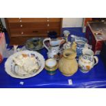 Ceramics to include a crudely repaired Moorcroft vase, various figures, jugs etc
