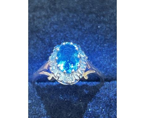 9ct Gold ring set with blue topaz & diamonds Size K 2.3g 