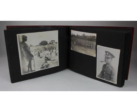 British Army photo album with many photos of Nigerians and their tribal face markings, each photo named. Appears to have belo