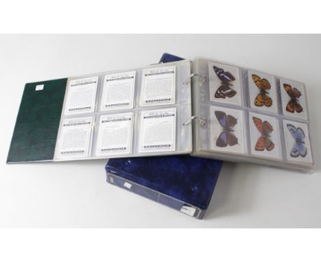 Collection of 42 complete sets + a few oddments contained in 2 modern albums, 1 of large cards &amp; 1 of cigar cards, sets f
