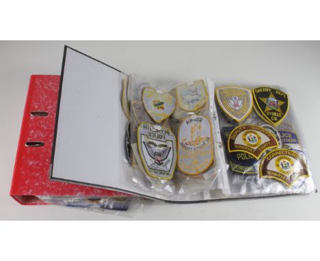 United States Police cloth patch collection housed in two large folders  (approx 300)