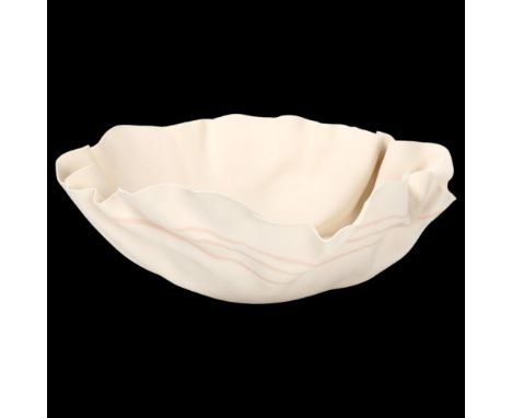 Roma Babuniak, a studio ceramic porcelain bowl with crumpled edge, 1988, poured porcelain strip decoration, with initials and