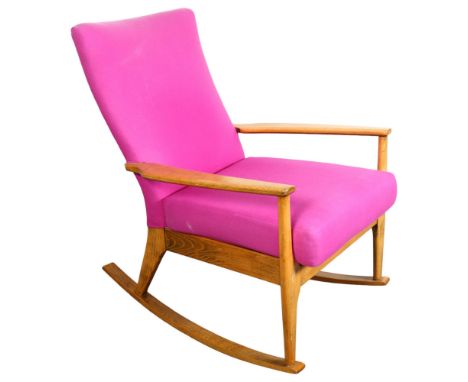 A 1950s/60s Parker Knoll model PK988 rocking chair, upholstered in purple wool fabric, makers stamp to frame, height 92cm, wi