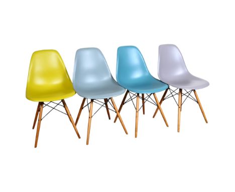 4 Vitra Eames DSW side chairs, harlequin set on golden maple legs, makers stamps and original labels under seat, height 83cmG