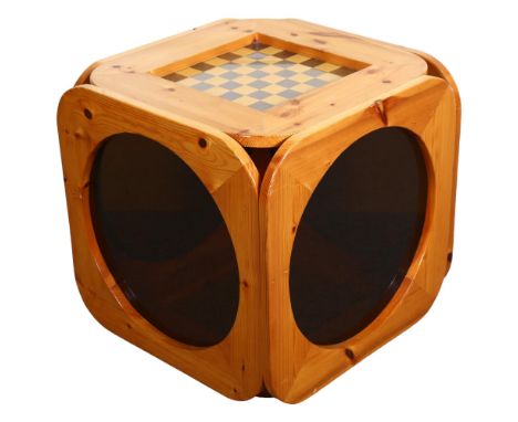 A 1970s pine chess table, the sides with circular smoked perspex panels, top 51.5cm Sq, height 50cm Good vintage condition, s