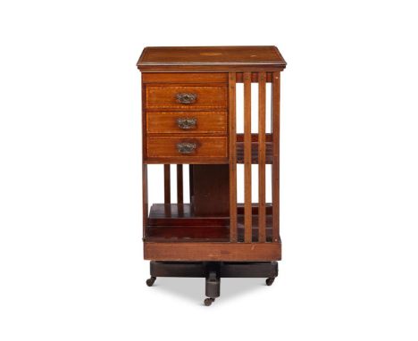 AN EDWARDIAN MAHOGANY AND SATINWOOD CROSSBANDED REVOLVING BOOKCASE CIRCA 1905 83.5cm high, 48cm wide, 47.5cm deep  Condition 