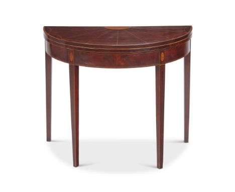 A GEORGE III MAHOGANY AND INLAID CARD TABLE  CIRCA 1780 Of semi-elliptical outline, the top with radial veneers enclosing a b