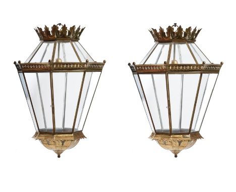 A PAIR OF BRASS HALL LANTERNS  20TH CENTURY  Each with foliate coronet above octagonal tapering glazed body, single electric 