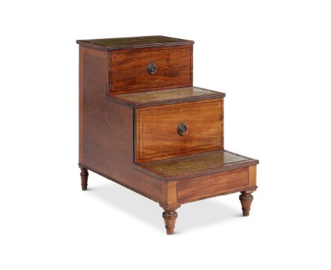 A WILLIAM IV MAHOGANY LIBRARY STEP COMMODE CIRCA 1835 The flight of steps enclosing compartments, each step with a leather in