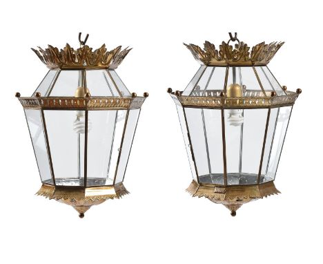 A PAIR OF BRASS HALL LANTERNS  20TH CENTURY  Each with foliate coronet above octagonal tapering glazed body, single electric 