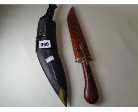 Vintage Kukri in scabbard and a Indonesian knife            