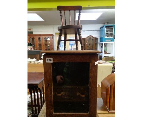 Oak Smokers cabinet and a model of a stick back chair         