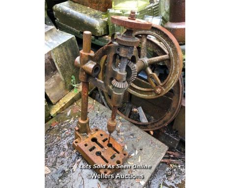 VINTAGE PILLAR DRILL AND HEAVY GEAR WHEEL ON STAND