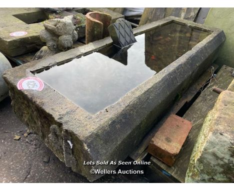 A LARGE STONE TROUGH 152CM (L) X 50CM (W) X 23CM (D)